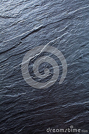 Dark grey, black stone background. Rock texture. Black slate vertical background Stock Photo