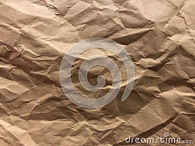 Dark and light brown, cream board as crumpled foil gilding paper Stock Photo