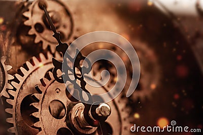 Dark magical clock face with gold and metal gears. Steampunk style. Engine Gears Wheels Stock Photo