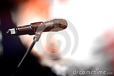 Dark microphone on stand Stock Photo