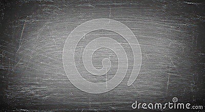 Authentic dark chalkboard surface background showing minimal texture variation and sparse fine dust specks Stock Photo