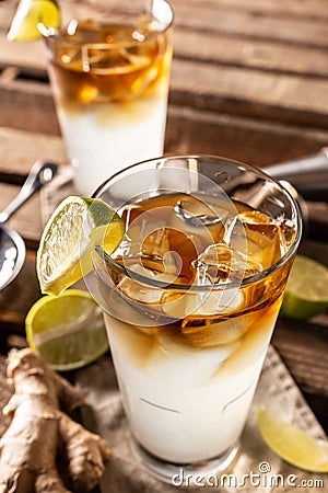 Dark n Stormy highball cocktail served as a long drink with rum, fresh lime juice, and ginger beer Stock Photo