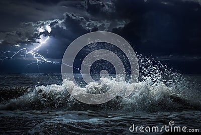 Dark ocean storm with lgihting and waves at night Stock Photo