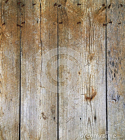 Dark old retro weathered knotted wood fence boards planks vintage architectural background Stock Photo