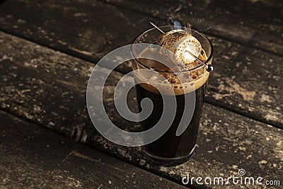 Dark Porter Beer with toasted Marshmallow Stock Photo