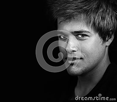 Dark portrait of one handsome confident man Stock Photo