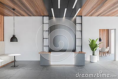 Dark reception desk front view in open space hall, wooden ceiling and white walls Stock Photo