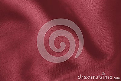 Dark red colored Background of soft draped fabric Stock Photo