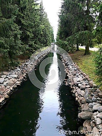 Dark river in the park Stock Photo