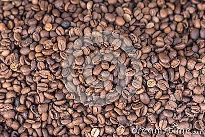Dark roast coffee beans background Stock Photo