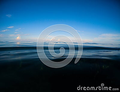 Dark sea and deep blue sky. Double landscape with sea water and sky. Stock Photo