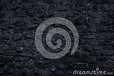 Dark stone background. Black rock wall texture. Abstract pattern. Natural backdrop. Decoration gray tiles at the facade of the bui Stock Photo
