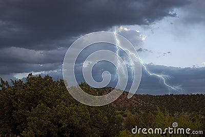 Dark storm clouds with lightning Stock Photo