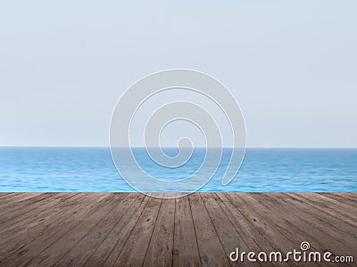 Dark timber foreground with sea scape background Stock Photo