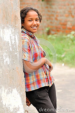 Dark toned poor girl Stock Photo