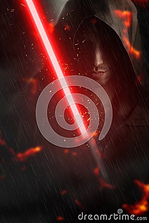 Dark young man holding a lightsaber Stock Photo