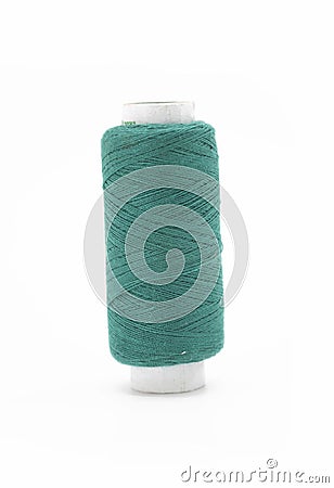DarkCyan yarn on spool, yarn on tube, cotton, wool, linen thread, isolate on white background Stock Photo
