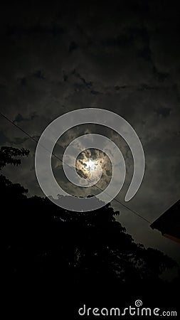 Darker Night and Moon View Stock Photo