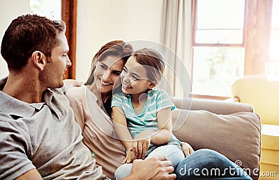 The darlings of Dads life. a family bonding together at home. Stock Photo