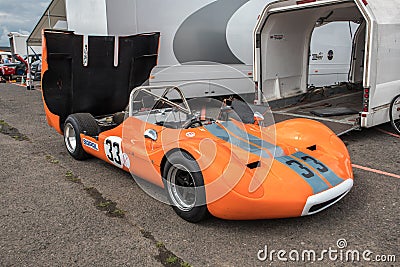 Orange retro classic racing car with engine cover up Editorial Stock Photo