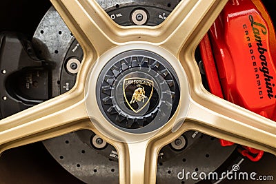 Darlington UK; August 2020: Gold lamborghini wheel trims at an Auto Show car show Editorial Stock Photo