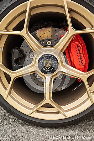 Darlington UK; August 2020: Gold lamborghini wheel trims at an Auto Show car show Editorial Stock Photo