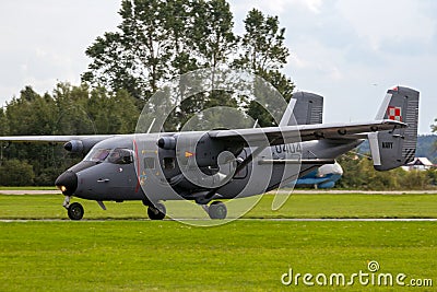 DARLOWO, POLAND - AUG 22, 2014: Polish Navy PZL M28 Skytruck plane taxiing before taking off. The M28 is a license-built Antonov Editorial Stock Photo