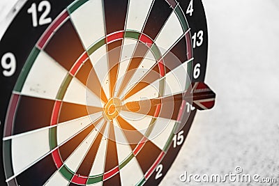 Dart board and arrow in middle. Business and success concept. Ac Stock Photo