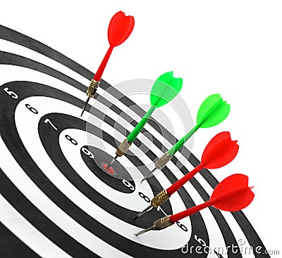 Dart board with color arrows hitting target Stock Photo