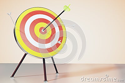 Dart board on the table and a direct hit on target Stock Photo