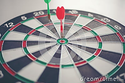 Dart hits Bullseye is a target and goal of business marketing as Stock Photo