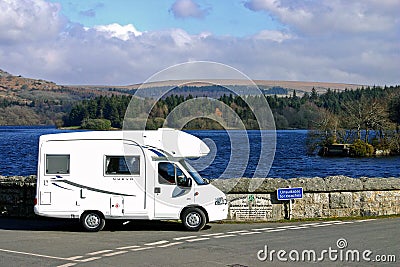 Dartmoor England. Motorcaravan, motorhome, recreational vehicle parked by Burrator reservoir Editorial Stock Photo