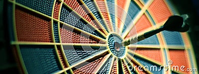 Darts arrows in the target center. Selective focus Stock Photo