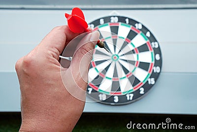 Darts and dartboard arrow game Stock Photo