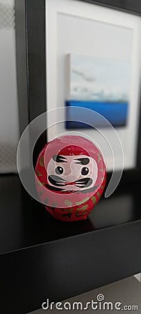 Daruma giapponese rosso, con occhi Stock Photo