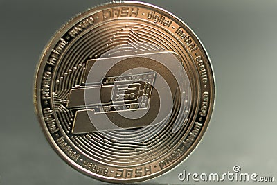 Dash. Crypto currency silver coin, Macro shot of Dash coin isolated on background, cut out Blockchain technology, Editorial Stock Photo