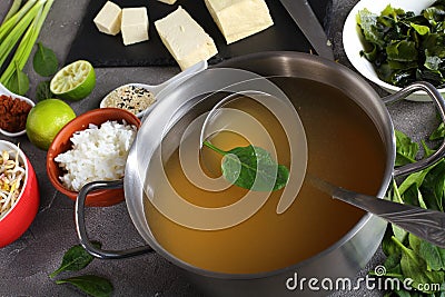 Dashi in a stainless casserole, close-up Stock Photo