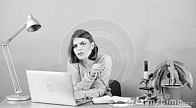 Data and information. Business woman. chemist biologist with microscope. woman work in office on laptop. tired secretary Stock Photo