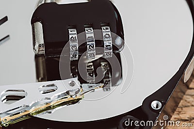 Data privacy, security and safety for computer system concept, combination pad lock with numbers password to unlock on hdd, Stock Photo