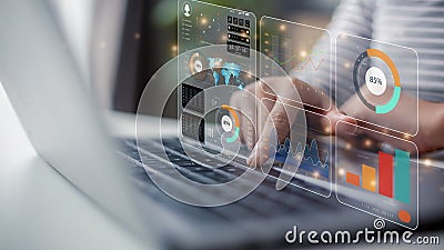 Data scientists. a programmer using a laptop to analyze and develop various information on a futuristic virtual interface screen Stock Photo