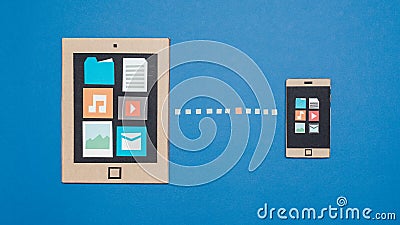 Data sync on cardboard devices Stock Photo