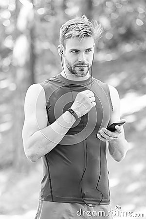 Data synchronization. digital sport. smart watch. athletic man in sportswear. outdoor workout. Fitness app. Ui ux Stock Photo