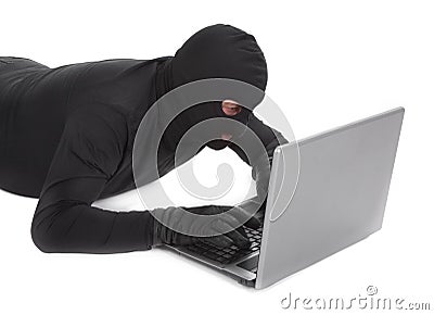 Data thief with laptop Stock Photo