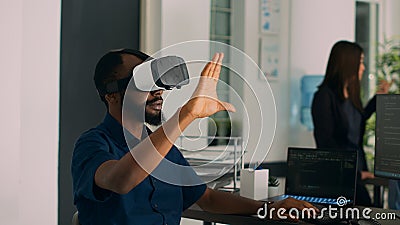 Database admin working with virtual reality glasses to develop server app Stock Photo