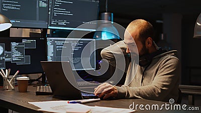 Database programer writing code and dealing with back pain Stock Photo