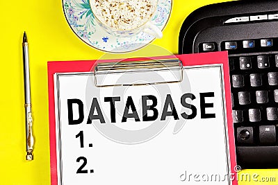 Atabase. A text label in a working notebook. Stock Photo
