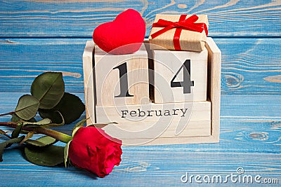 Date of 14 February on calendar, gift, red heart and rose flower, Valentines day concept Stock Photo
