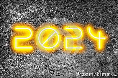 The date 2024 in glowing numbers on a textured background Stock Photo