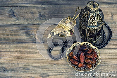 Dates, arabian lantern and rosary. Islamic holidays concept Stock Photo
