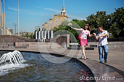 Dating young men and women lovers Stock Photo